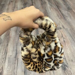 Fuzzy cheetah print purse